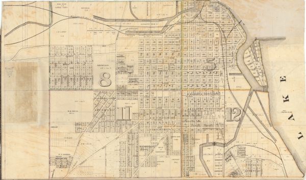 This map shows wards, sections, roads, lot and block numbers, subdivisions, and proposed streets. The inside cover includes hand written annotations that read: "Map of the 5th, 8th, 11th, 12th wards of the city of Milwaukee. Milwaukee, Jany 16th, 1879, Theodore D. Brown, dep. county surveyor". An additional handwritten annotation in red reads: "Note: Stone Monuments are marked thus: (red dot)". A typed note is pasted in the inside cover as well: "Map book of Theodore D. Brown, C.E. He was the earliest city engineer of the city of Milwaukee. Under the direction the original Govt pier, the watertower, the Kilbourn Park reservoir, the old Grand Ave. viaduct and the earliest sewage system of that city were built."
