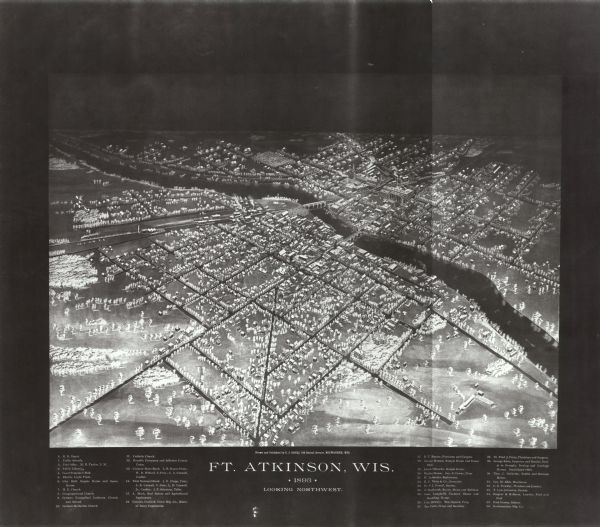 This photocopy of a bird’s-eye-view map shows illustrated houses and various buildings. Streets and the Rock River are labeled. An index to points of interest is included.
