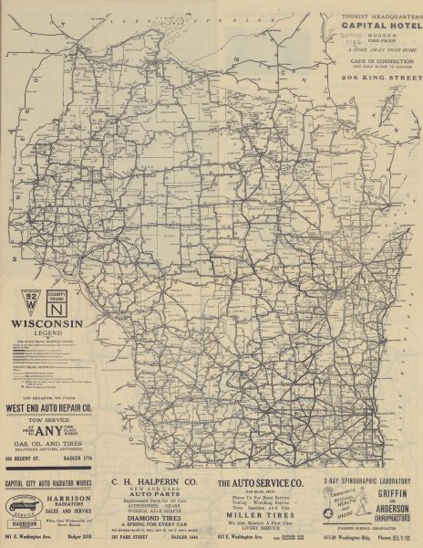 A two-sided map of the state of Wisconsin. The front includes towns and major cities as well as state and county trunk highways. The back includes a smaller road map of southern Wisconsin. Local business advertisements appear on front and back. 
