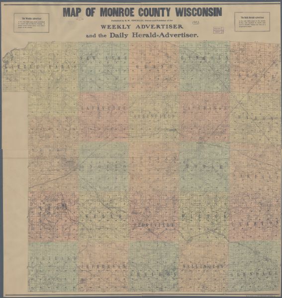 This map shows townships and sections, landownership and acreages, roads, railroads, and selected rural buildings. Townships and sections appear in yellow, green, orange, pink, and blue. The top of the map below the title reads: "Weekly Advertiser and the Daily Herald-Advertiser." A box in the upper left corner reads: "The Weekly Advertiser is the only eight page paper published in county seat of Monroe County. It prints more news than any other paper in the county." A box in the upper right corner reads: "The Daily Herald-Advertiser is the only daily paper in the county. It has now reached its fourth year and is steadily leading the way as a progressive paper."
