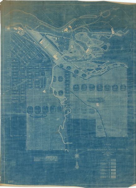 This blueprint manuscript map shows land owned by Kaukauna Water Power Co., Green Bay & Mississippi Canal Co., A.W. Patten, N.M. Edwards, and M.J. Meade. Part of southern Kaukauna is also shown. The bottom right of the corner includes a key.