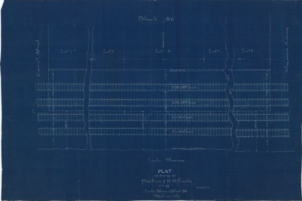 This blueprint map shows proposed railroad tracks between Carroll Street and Wisconsin Avenue along Lake Monona.