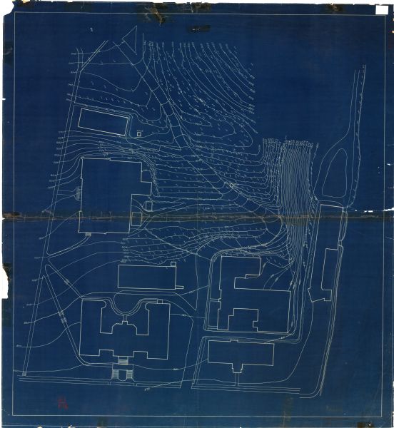 This manuscript blueprint map shows building outlines in vicinity of North Hall and Science Hall, retaining walls, and walkways.