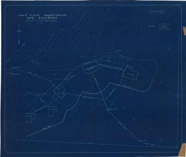 This manuscript blueprint map shows buildings, water works, a stone wall, and paths.