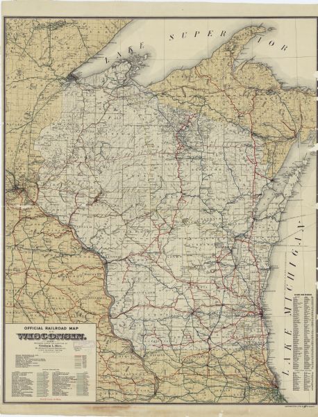 This map shows railroad routes in red, blue, orange, brown, pink, green, and dotted, as well as lakes, rivers, and communities. The map includes a legend in the lower left corner of railroad lines, with total mileage. Portions of Illinois, Iowa, Minnesota, and Michigan are visible. Lake Superior and Lake Michigan are labeled.