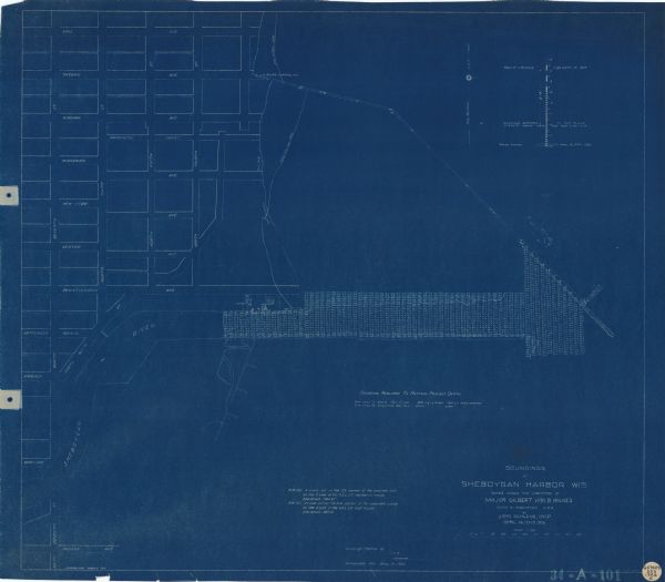 This blueprint map shows the Sheboygan River, buildings, and roads in the vicinity of the harbor. The map has explanations including "dredging required to restore project depth" and a water surface diagram. Water depths shown by soundings and tints.