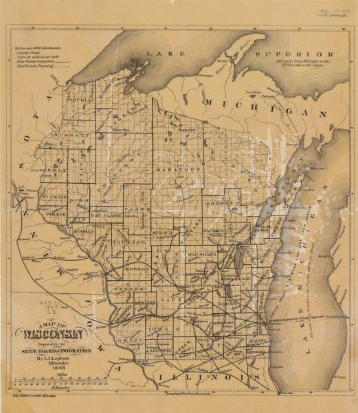 This map shows the configurations of the counties, communities, railroads and projected railroads, mines, shipping routes, and labeled rivers and lakes. Portions of Minnesota, Michigan, Iowa, and Illinois are visible.