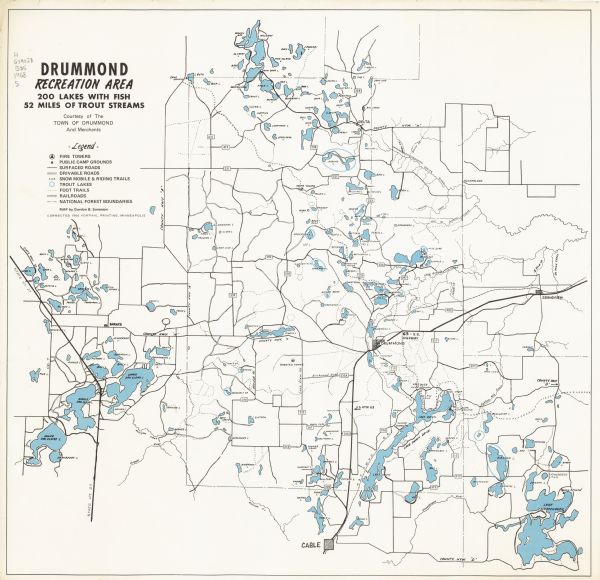 The map shows fire towers, public camp grounds, roads, snow mobile & riding trails, trout lakes, foot trails, railroads, and National Forest boundaries.