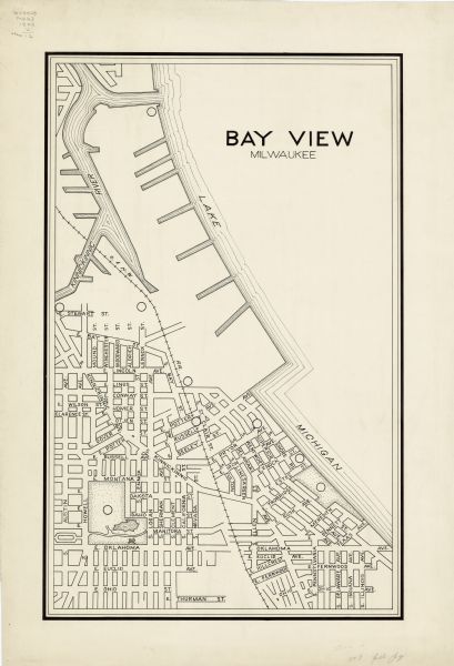 This map is pen and ink on paper and is map 12 in a series of 12. The map shows streets, railroad lines, the Kinnickinnic River, and Lake Michigan.