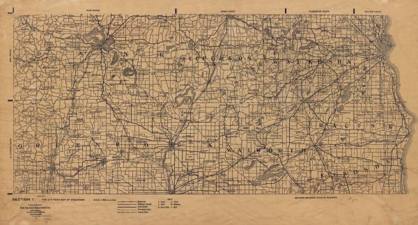 This map shows railroads, ordinary roads, good roads, township lines,   county lines, county boundaries, towns, lakes, and rivers in the southeastern part of the state, south of Watertown and east of Blue Mounds. Legend indicates road type, road quality, and hilliness.