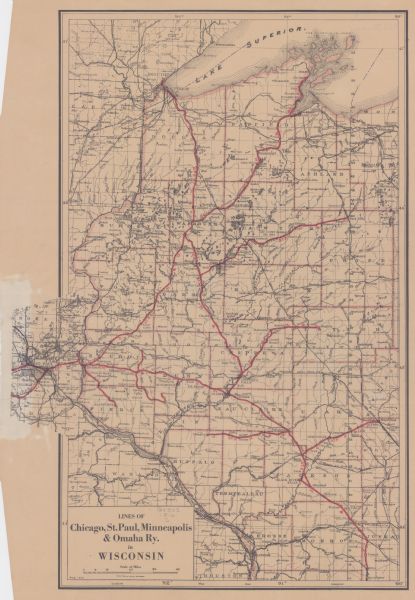 This map shows railroads, cities, rivers, lakes, and county boundaries. Select railroads are outlined in red. Portions of western Wisconsin Minnesota are visible. Lake Superior is seen at the top of the map. 

