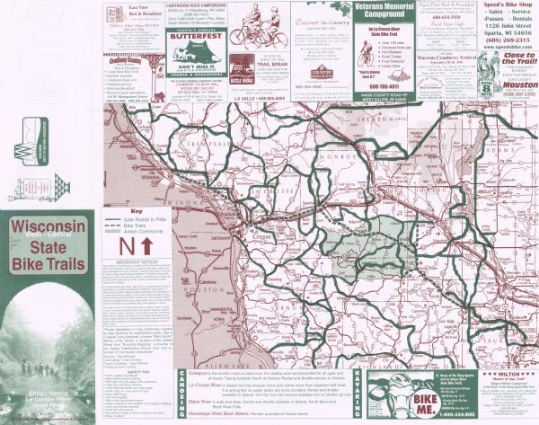 This map shows county boundaries, cities, roads, and bikes trails in the west-central region in  Wisconsin. Portions of Minnesota and Iowa are visible. Includes advertisements on the front and back of the map.  The back of the map give a detailed view of five bike trails.