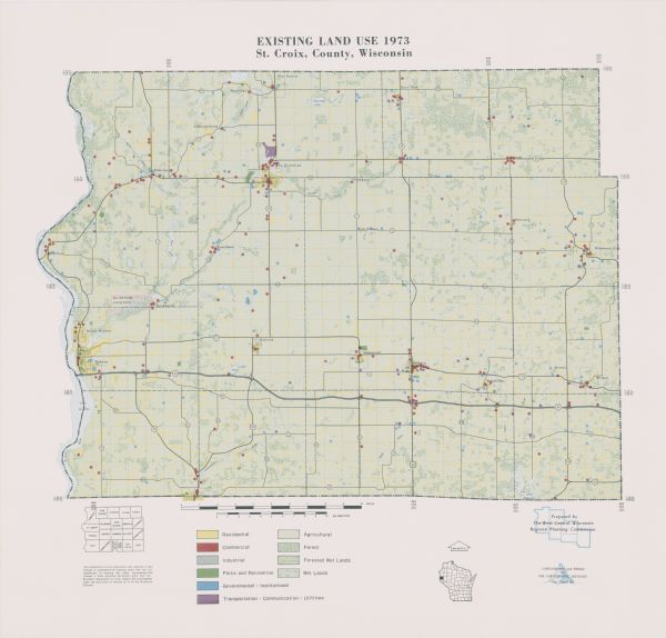 This map shows the uses of land in St. Croix County. Uses are indicated by colored dots. Residential(Yellow), Commercial(Red), Industrial(Grey), Parks and Recreation (Green), Governmental-Institutional (Blue), Transportation-communication-utilities (Purple), Agricultural (White), Forest (Green and White pattern), Forested Wet lands ( green, blue and white pattern), and Wet Lands (Blue and White pattern). Includes a township diagram and location map.