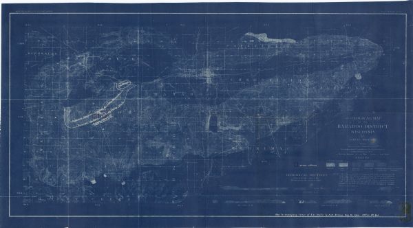 This blue line print map includes 4 cross sections with relief shown by contours and spot heights. The topography was taken from the United States Geological Survey.