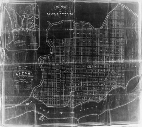 Map shows the Fox River, lot and block numbers, private claims, streets, a public squares, a manual labour school, and Fort Howard. An inset map shows a plat of Astor and Navarino.