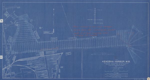 This blueprint map shows the harbor at Kenosha, also showing buildings surrounding the harbor, roads, and railroads. Original caption in red states: "Areas inclosed in red were dredged during June 1926 restoring the project depth of 19 feet. Sounding after dredging not available."