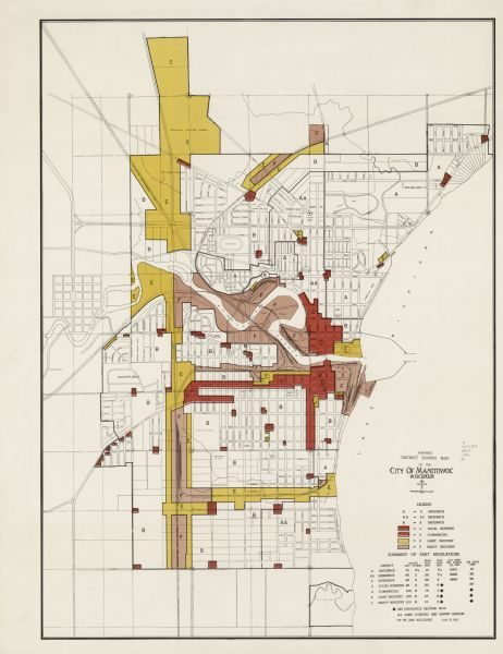 This map shows city streets, zoning of city areas, residences, local businesses, and commercial areas marked in red, yellow, and light brown. The bottom right corner includes a legend. Lake Michigan is labeled on the far right.