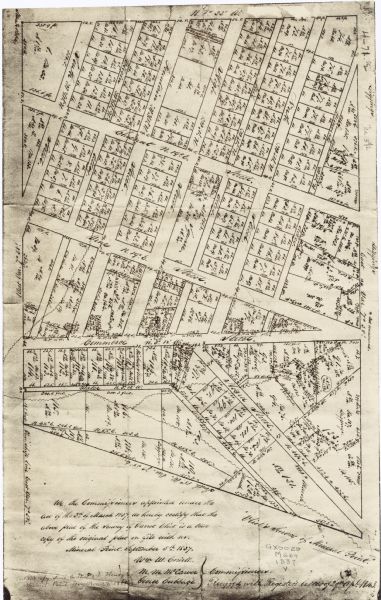 This facsimile of manuscript map shows lot numbers, dimensions, streets, and township lines. The bottom left corner includes a certification. 