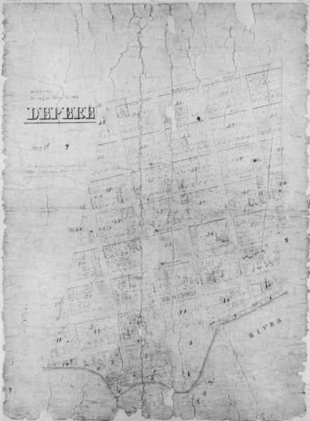 This photocopy map shows lot and block numbers, some land ownership, street names, and the Fox River. Caption reads, "Mr. P.S. Levy says this map was drawn in 1836."