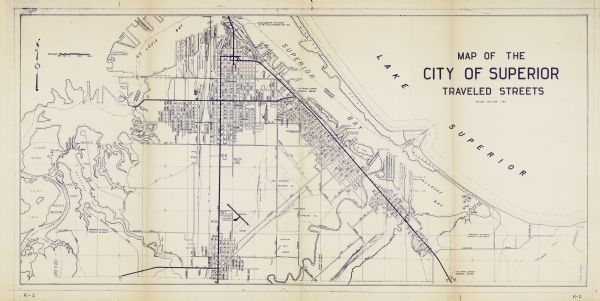 This blue line print shows existing and proposed streets, docks, company-owned land, railroads and railroad yards, parks, and municipal airport.