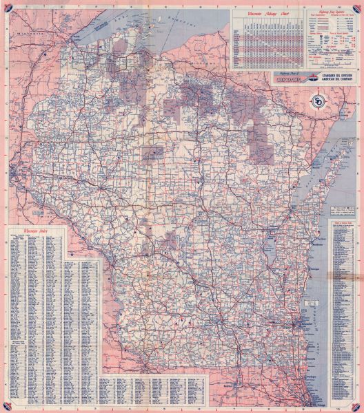 This colored road map shows automobile roads in Wisconsin as well as portions of nearby states. Information on the quality and type of any road shown (interstate highway, county road, paved,unpaved, etc.) can be found in the legend near the top right corner, next to a mileage chart showing distances between cities and towns in  Wisconsin.  In the bottom left corner, there is an index of Wisconsin towns and cities, showing their map location as well as population.  On the right side is a Points of Interest index, listing primary recreational areas, parks, museums, schools and other tourist attractions, and their map locations. The Standard Oil logo appears on each of the four corners front side of the map.  On the back side of the map are detailed maps of Green Bay, Madison, Racine, Duluth- Superior, Kenosha, and Milwaukee. Additionally there is a map of the Great Lakes region, showing states contiguous to the Great Lakes.  At the bottom is a section called "Parks and Recreational Areas of Wisconsin," featuring 43 state and local parks, including a graphic of Devil's Lake State Park. On the left bottom of the map is an advertisement for the Standard Oil Credit Card.