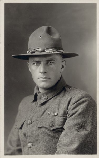 Quarter-length studio portrait of Leo Birrenkott wearing a military uniform.