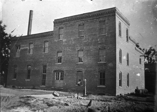 Exterior view of the original Oderbolz Brewery, southeast corner of Fourth Street and Pierce Street. Later Rock Spring Cold Storage.