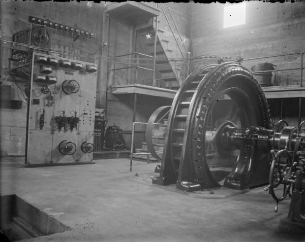 Indoor view of machinery inside a powerhouse.