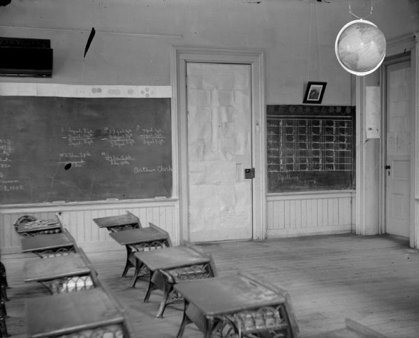 Interior view of a classroom. Identified as a classroom in the school building built in 1872.