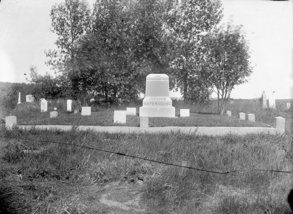 Cemetery with Judkins-Waterhouse marker. Identified location as west of Alma.