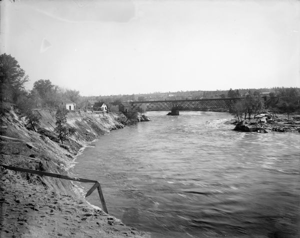 Elevated view of the Black River after the 1911 flood. Severely eroded banks are on the left.