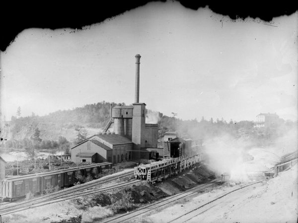 Elevated view of the York Iron Mine. Railroad tracks are in the foreground.