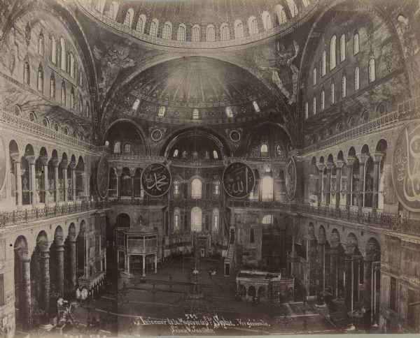 Interior view of the Hagia Sophia in Istanbul, Turkey. This building has been a Orthodox patriarchal basilica, a Mosque and is now a museum. This image was included in a photo album documenting a trip made by Violet Dousman to Egypt in 1896.