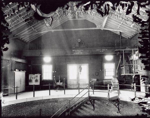 Interior of a factory with a Pawling and Harnischfeger bridge and trolley.