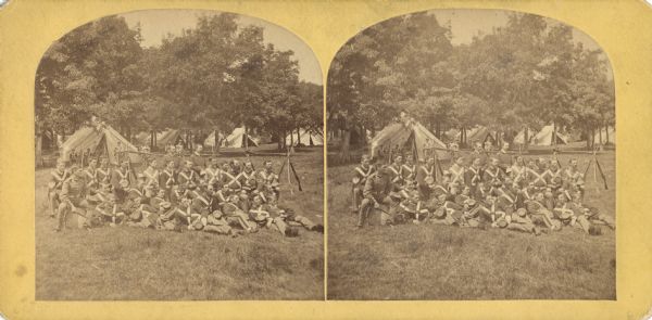 Quite possibly this is the "View of Capt. L.M. Lange's Company" listed in the "Centennial Views of the City of Madison, July 4th, 1876. Views of Chicago Light Guard" section of Dahl's 1877 "Catalogue of Stereoscopic Views."