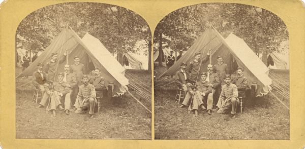 Quite possibly this is the "View of Capt. L.M. Lange's tent and seven Captains" listed in the "Centennial Views of the City of Madison, July 4th, 1876. Views of Chicago Light Guard" section of Dahl's 1877 "Catalogue of Stereoscopic Views."<p>View of Capt. L.M. Lange's tent and seven captains encamped on Lake Monona, probably in preparation for the Centennial Celebration held in Madison on July 4, 1876.