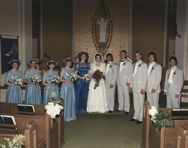 Wedding party of William Olson and Rebecca Butcher at St. Luke's Lutheran Church, Middleton, Wisconsin on June 20, 1987. Jill Howman, wearing the dark blue dress, was the maid of honor.