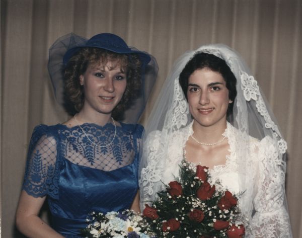 Close-up portrait of Rebecca (Butcher) Olson on her wedding day with her maid-of-honor Jill Howman.  Rebecca married William Olson on June 20, 1987 at the St. Luke's Lutheran Church in Middleton, Wisconsin.