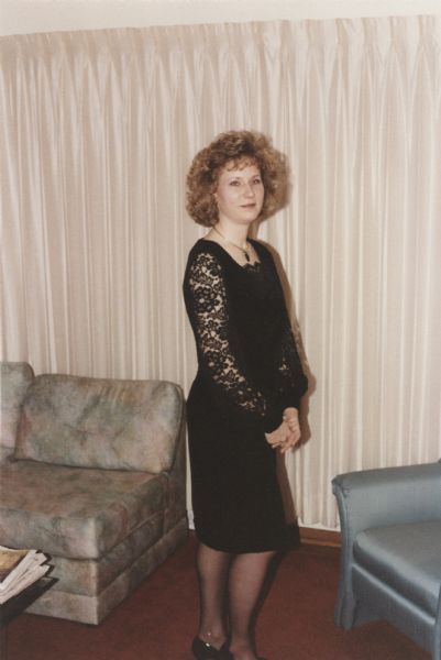 Jill Bremigan in a black velvet and lace cocktail dress that she made from Butterick pattern 6402 (1992).  She wore it to a Christmas party held in Madison, Wisconsin, by the company her husband, Cary Bremigan, worked for at the time.