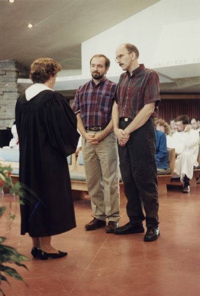 Holy Union ceremony of Brian Bigler (right) and Ken Scott (left) on July 22, 1995 at the First Unitarian Church, Madison, Wisconsin.  This may have been one of the first such unions in Madison.  Minister Bonnie-Jean Casey conducted the ceremony.