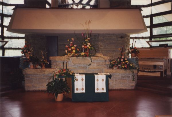 Flower arrangements and altar decorations at the First Unitarian Society for the Holy Union Ceremony of Brian Bigler and Ken Scott on July 22, 1995.  The altar cloths were made by a friend, Olga, from the Ukraine.