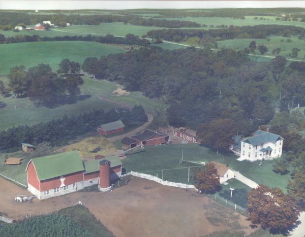 Hand-tinted aerial photograph of the Apps Farm in the Wild Rose vicinity.