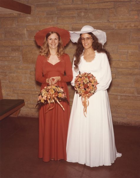 Full-length portrait of the bride and her matron of honor taken before the ceremony at the First Unitarian Society Meeting House.