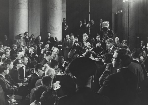 Senator Robert F. Kennedy announcing his candidacy for the office of President of the United States. The announcement took place in the Caucus Room of the Old Senate Office Building, the same place his late brother declared his candidacy for president eight years earlier.