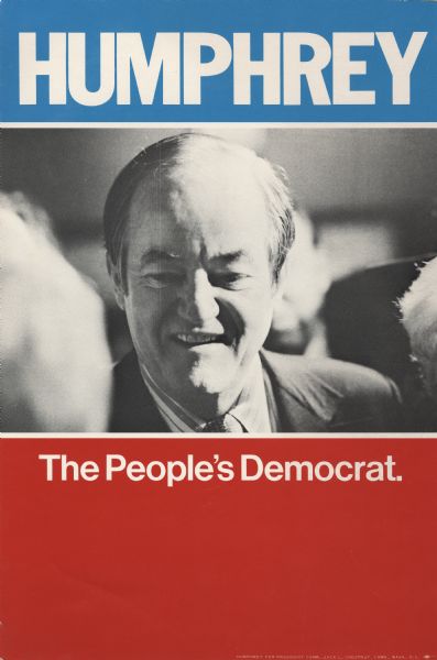 A simple campaign poster for Hubert Humphrey. The top has "Humphrey" in white on a blue field. The center is a black and white photograph of Humphrey. The bottom is red with the text "The People's Democrat." in white.