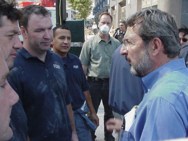 Wisconsin Congressman David R. Obey (right) talking with New York City firemen who were involved in the rescue and recovery effort after the attack on the World Trade Center. Obey was touring the site only a few days after 9/11 as the ranking Democrat on the House Appropriations Committee that authorized emergency funding.