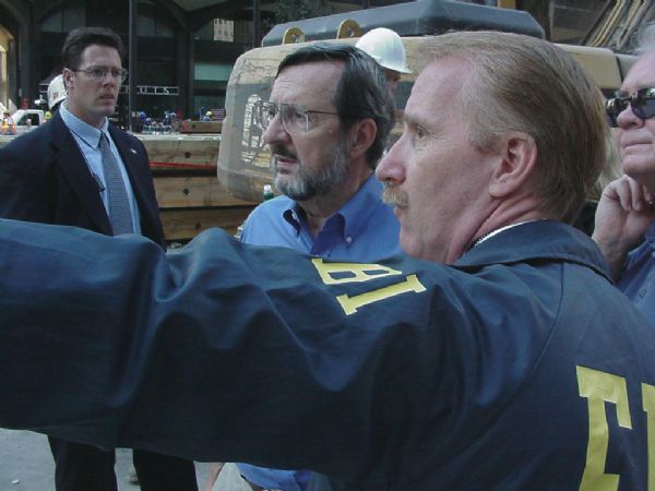 Wisconsin Congressman David R. Obey (center) at the World Trade Center Ground Zero a few days after 9/11. Obey was there as the ranking Democrat on the House Appropriations Committee to view conditions for which the committee would authorize cleanup funding. With Obey is an unidentified FBI official.