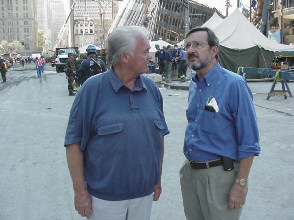 Wisconsin Congressman David R. Obey (right) looking at the World Trade Center site shortly after the 9/11 attacks. With Obey is Florida Congressman Bill Young. Young and Obey, the two leaders of the House Appropriations Committee, were present to see the damage first-hand. The precise location where they are standing has not been identified.