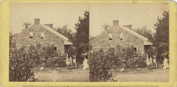 Stereograph of General Lee's headquarters at Gettysburg, photographed by Mathew Brady a few days after the battle. Two women appear on the lower right.