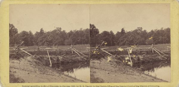 Stereograph of McPherson's Woods, where General John Reynolds, commanding the First Corps of which Wisconsin's 2nd, 6th, and 7th regiments were a part, was killed. This card was one of several Brady stereographs owned by Lucius Fairchild of the 2nd Wisconsin that was purchased at the Brady studio, probably in 1863. The importance of this image to Fairchild is clear. Not only did it represent the area where Reynolds died, but it was also near there that Fairchild was wounded, an injury that resulted in the amputation of his arm.